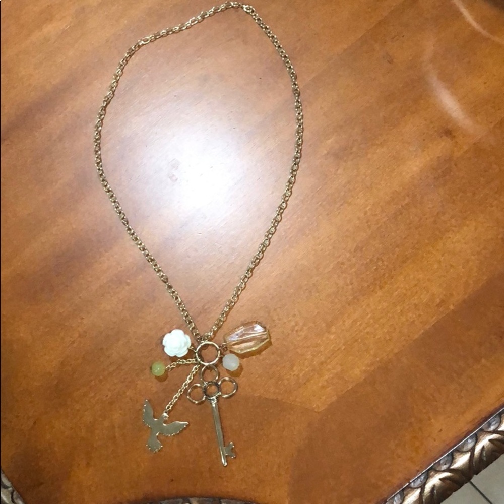Gold plated multi charm necklace